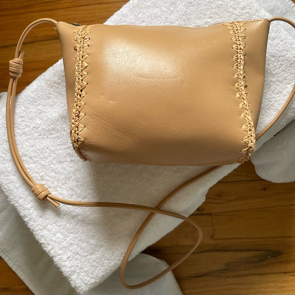 Universal Thread Goods Co. tan handbag.